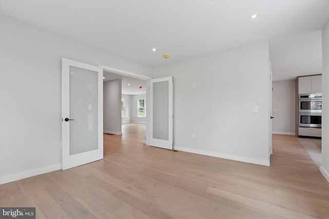 160 Union Ave, Bala Cynwyd, PA 19004 - empty room with light wood finished floors, baseboards, and recessed lighting
