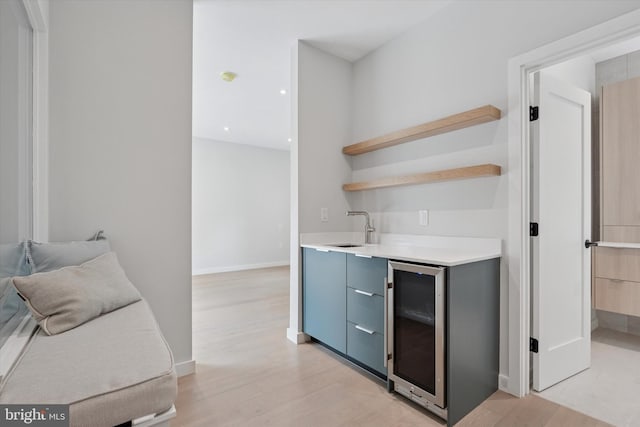 160 Union Ave, Bala Cynwyd, PA 19004 - indoor wet bar with beverage cooler, light wood-style flooring, baseboards, and recessed lighting