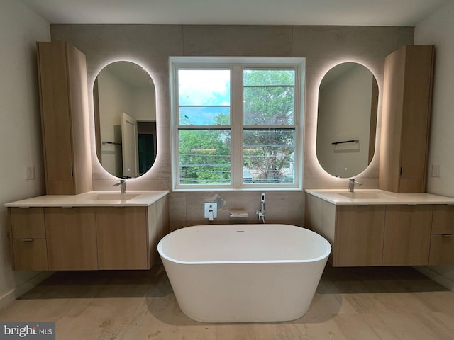 160 Union Ave, Bala Cynwyd, PA 19004 - bathroom with a freestanding tub and two vanities