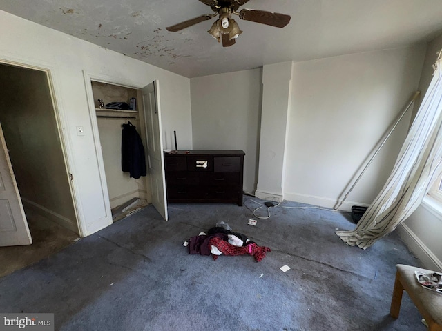 unfurnished bedroom featuring carpet flooring, baseboards, and a closet