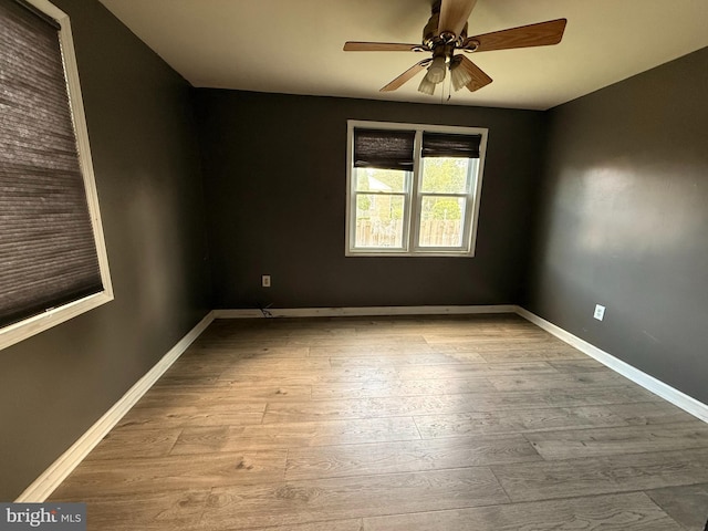 4703 Fayette Dr, Bristol, PA 19007 - spare room featuring a ceiling fan, wood finished floors, and baseboards