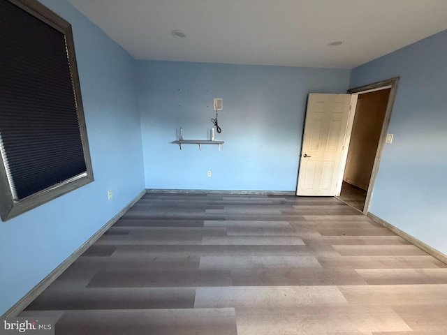 4703 Fayette Dr, Bristol, PA 19007 - spare room featuring wood finished floors and baseboards