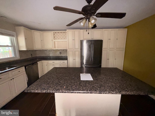 4703 Fayette Dr, Bristol, PA 19007 - kitchen featuring freestanding refrigerator, black dishwasher, a ceiling fan, a kitchen island, and a sink