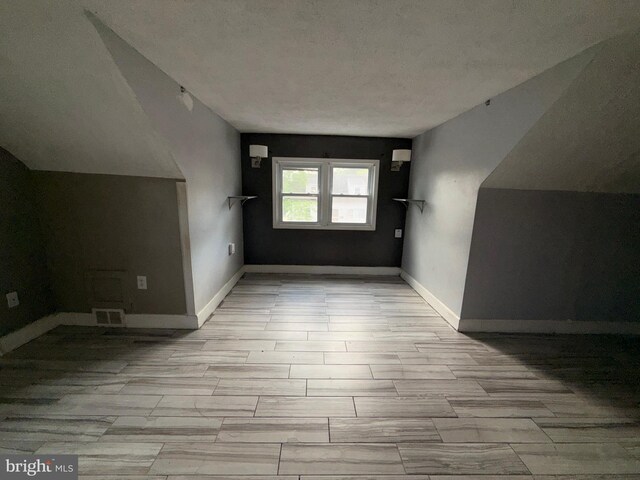 4703 Fayette Dr, Bristol, PA 19007 - additional living space with wood finished floors and baseboards