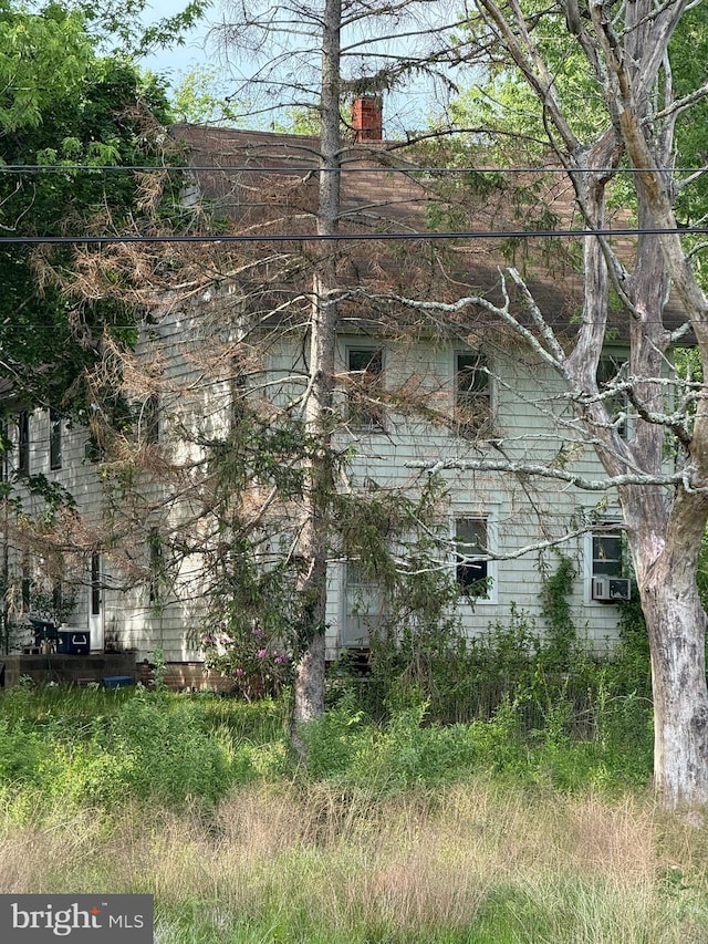 138 Robinson Rd, Salem, NJ 08079 - view of property exterior with a chimney and cooling unit