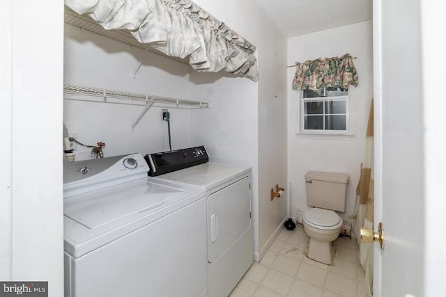 laundry area featuring washing machine and dryer
