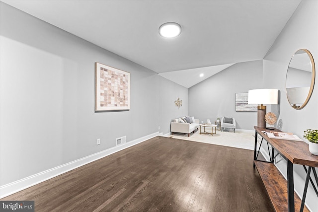 7606 Millrace Rd, Capitol Heights, MD 20743 - sitting room with wood finished floors, baseboards, and lofted ceiling