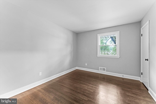 7606 Millrace Rd, Capitol Heights, MD 20743 - spare room with dark wood-style floors and baseboards