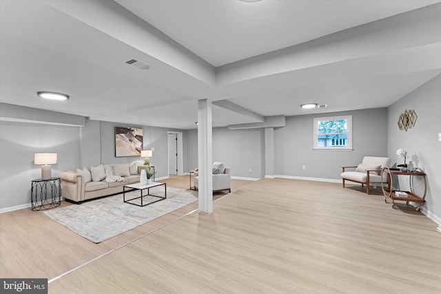 7606 Millrace Rd, Capitol Heights, MD 20743 - living room with wood finished floors and baseboards