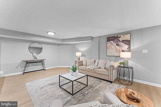 7606 Millrace Rd, Capitol Heights, MD 20743 - living area featuring baseboards and wood finished floors