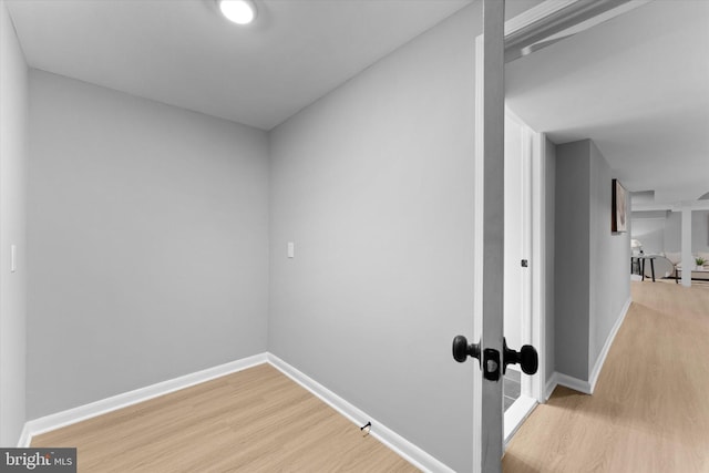 7606 Millrace Rd, Capitol Heights, MD 20743 - hallway featuring light wood-type flooring and baseboards