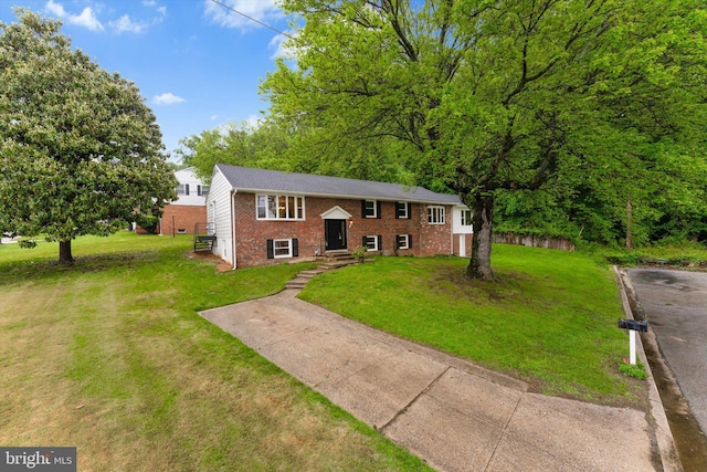 7606 Millrace Rd, Capitol Heights, MD 20743 - bi-level home featuring brick siding and a front yard