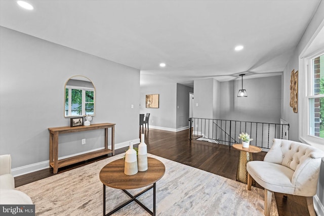 7606 Millrace Rd, Capitol Heights, MD 20743 - sitting room with an upstairs landing, wood finished floors, recessed lighting, and baseboards