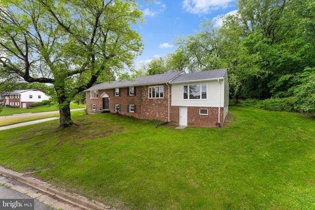 7606 Millrace Rd, Capitol Heights, MD 20743 - view of property exterior featuring a yard and brick siding