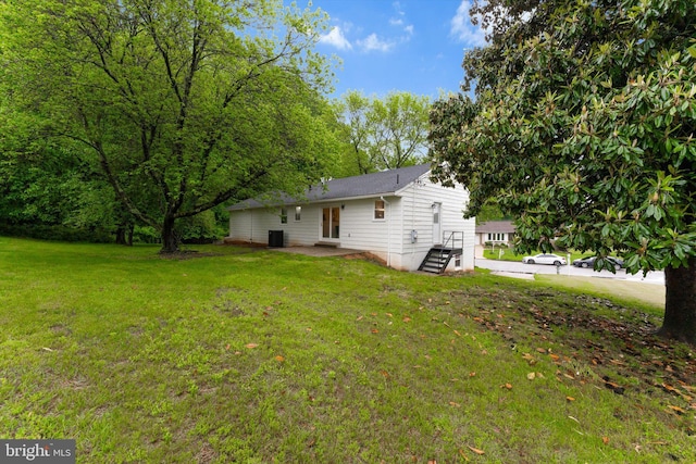 7606 Millrace Rd, Capitol Heights, MD 20743 - view of green lawn with central AC