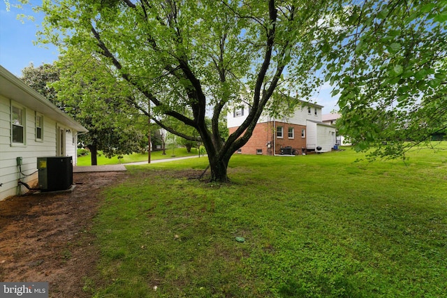 7606 Millrace Rd, Capitol Heights, MD 20743 - view of grassy yard featuring central air condition unit
