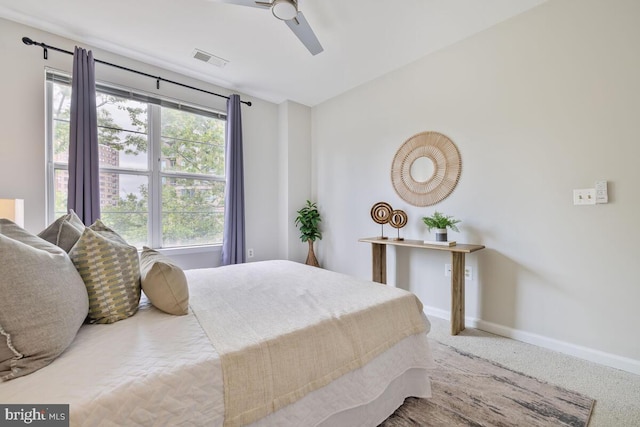 1201 E E W Hwy Unit 208, Silver Spring, MD 20910 - carpeted bedroom featuring baseboards and ceiling fan