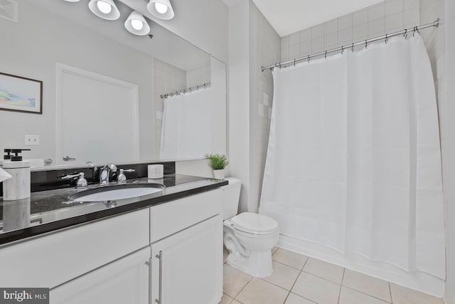1201 E E W Hwy Unit 208, Silver Spring, MD 20910 - bathroom featuring tile patterned floors, vanity, toilet, and shower / bathtub combination with curtain