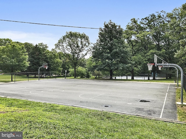 1201 E E W Hwy Unit 208, Silver Spring, MD 20910 - view of sport court featuring community basketball court and a lawn