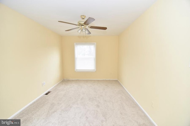 3171 Chester Grove Rd, Upper Marlboro, MD 20774 - spare room with light colored carpet, a ceiling fan, and baseboards
