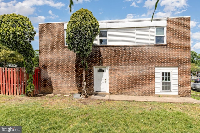 view of front of property with brick siding