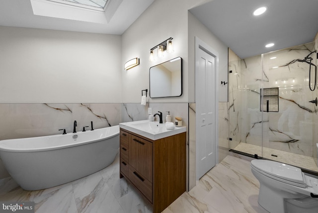 18 Haskel Dr, West Windsor, NJ 08550 - full bathroom with a marble finish shower, vanity, a skylight, a soaking tub, and recessed lighting