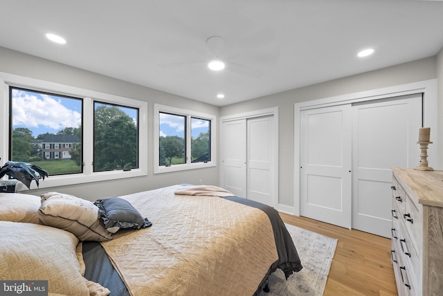 18 Haskel Dr, West Windsor, NJ 08550 - bedroom featuring multiple closets, light wood-style flooring, recessed lighting, and a ceiling fan