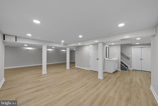 18 Haskel Dr, West Windsor, NJ 08550 - finished basement featuring light wood-style flooring, stairway, and recessed lighting