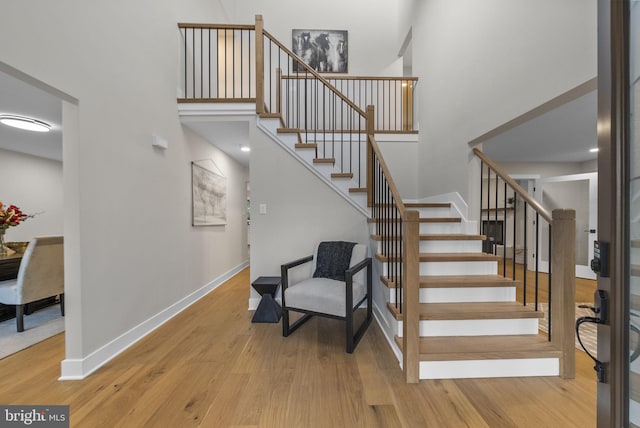 18 Haskel Dr, West Windsor, NJ 08550 - staircase featuring a towering ceiling and wood finished floors