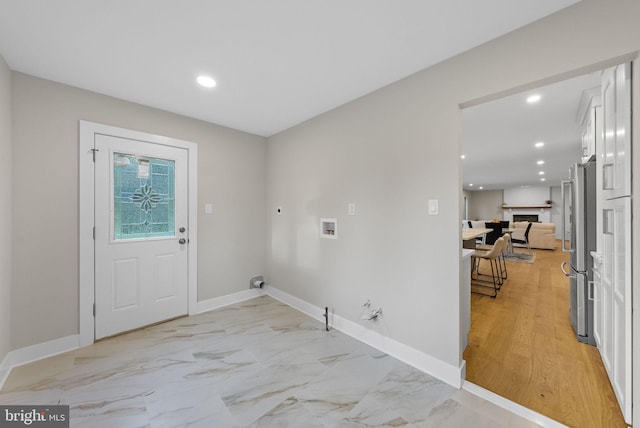 18 Haskel Dr, West Windsor, NJ 08550 - laundry area with hookup for a gas dryer, hookup for an electric dryer, hookup for a washing machine, recessed lighting, and a fireplace
