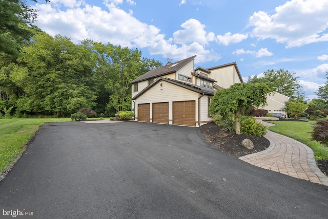18 Haskel Dr, West Windsor, NJ 08550 - view of property exterior with asphalt driveway and an attached garage