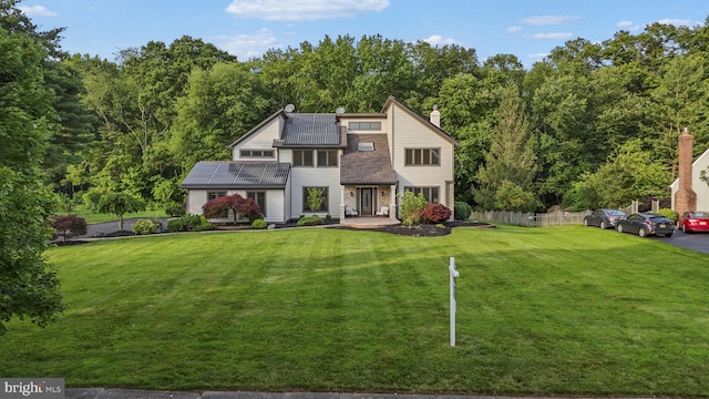 18 Haskel Dr, West Windsor, NJ 08550 - view of front of property featuring solar panels and a chimney