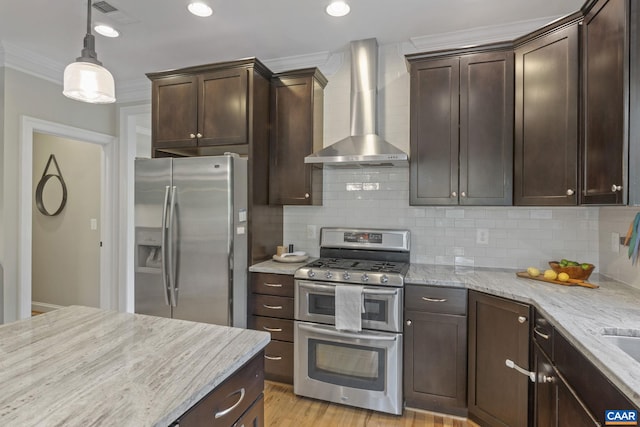 125 Highland Cir, Zion Crossroads, VA 22942 - kitchen with ornamental molding, visible vents, dark brown cabinetry, wall chimney range hood, and stainless steel appliances