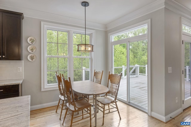 125 Highland Cir, Zion Crossroads, VA 22942 - dining room with plenty of natural light, baseboards, ornamental molding, and light wood-style floors