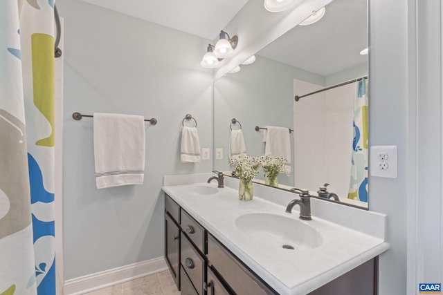 125 Highland Cir, Zion Crossroads, VA 22942 - full bath with baseboards, double vanity, a sink, and a shower with shower curtain