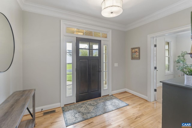 125 Highland Cir, Zion Crossroads, VA 22942 - foyer entrance with ornamental molding, baseboards, visible vents, and wood finished floors