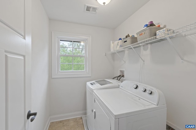 125 Highland Cir, Zion Crossroads, VA 22942 - clothes washing area with washer and clothes dryer, laundry area, baseboards, and visible vents