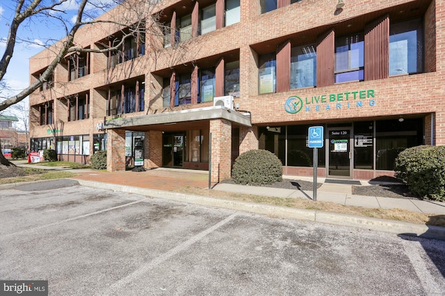 18707 Walkers Choice Rd Unit 6, Gaithersburg, MD 20886 - view of apartment building / complex featuring uncovered parking