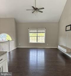 108 Irwin Ct, Hedgesville, WV 25427 - unfurnished living room with high vaulted ceiling, baseboards, dark wood-style floors, and a ceiling fan