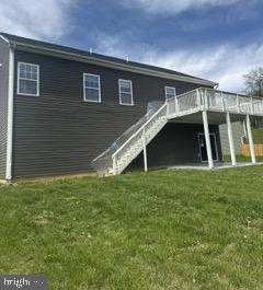 108 Irwin Ct, Hedgesville, WV 25427 - rear view of house with stairway, a deck, and a lawn