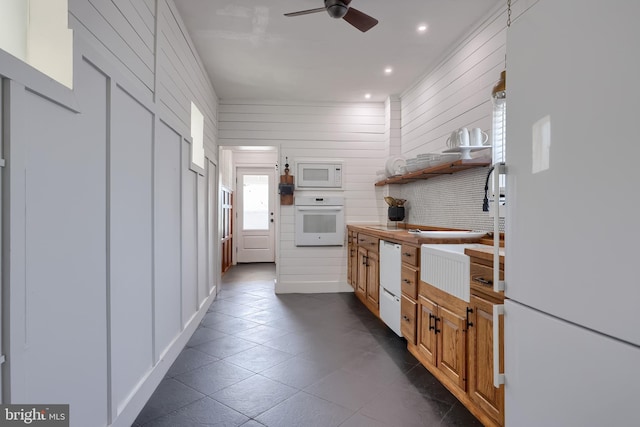 kitchen featuring white appliances, a ceiling fan, recessed lighting, open shelves, and dark tile patterned flooring