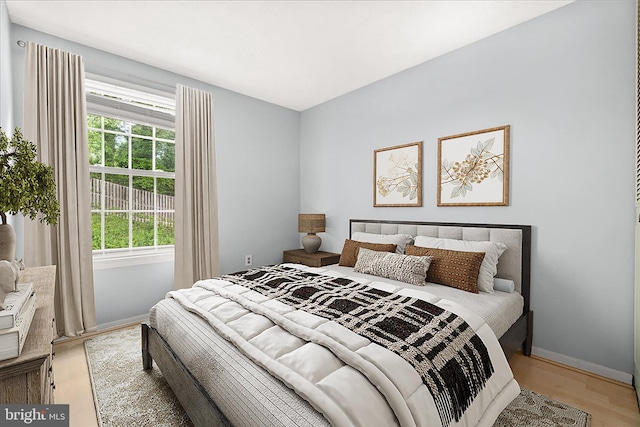 6436 Rockledge Ct, Elkridge, MD 21075 - bedroom with light wood-type flooring and baseboards