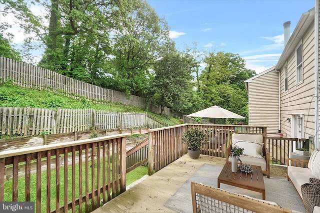 6436 Rockledge Ct, Elkridge, MD 21075 - wooden deck with a fenced backyard and outdoor lounge area