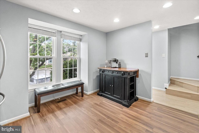 6436 Rockledge Ct, Elkridge, MD 21075 - bar area featuring light wood-style flooring, baseboards, and recessed lighting