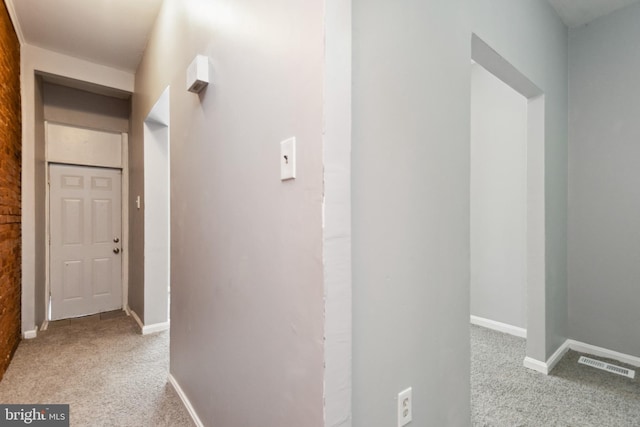 908 Mckean Ave, Baltimore, MD 21217 - hallway featuring carpet flooring, visible vents, and baseboards