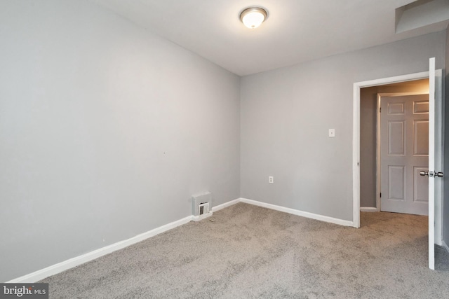 908 Mckean Ave, Baltimore, MD 21217 - carpeted spare room with visible vents and baseboards