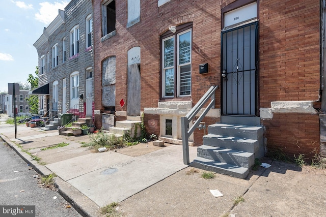 908 Mckean Ave, Baltimore, MD 21217 - view of exterior entry with brick siding