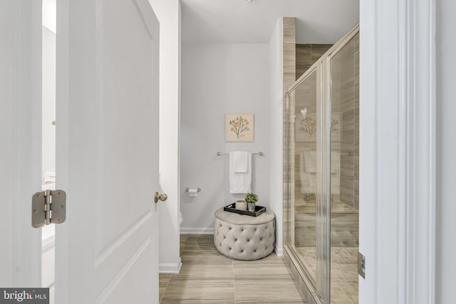 5992 Passend Dr, Frederick, MD 21703 - bathroom with a stall shower, toilet, and baseboards