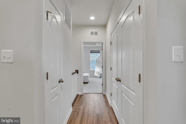 5992 Passend Dr, Frederick, MD 21703 - hallway with wood finished floors, recessed lighting, and baseboards