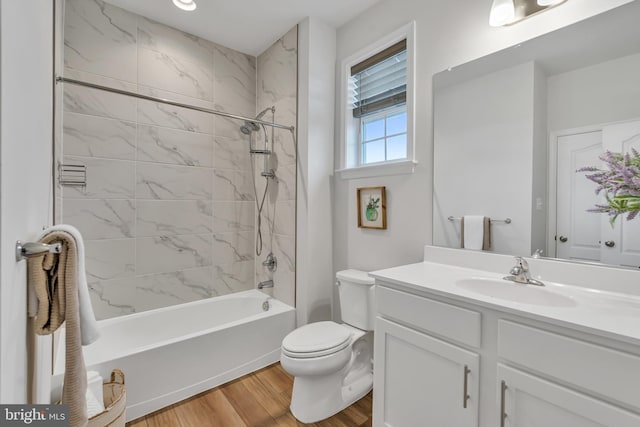 5992 Passend Dr, Frederick, MD 21703 - full bathroom featuring wood finished floors, vanity, shower / washtub combination, and toilet